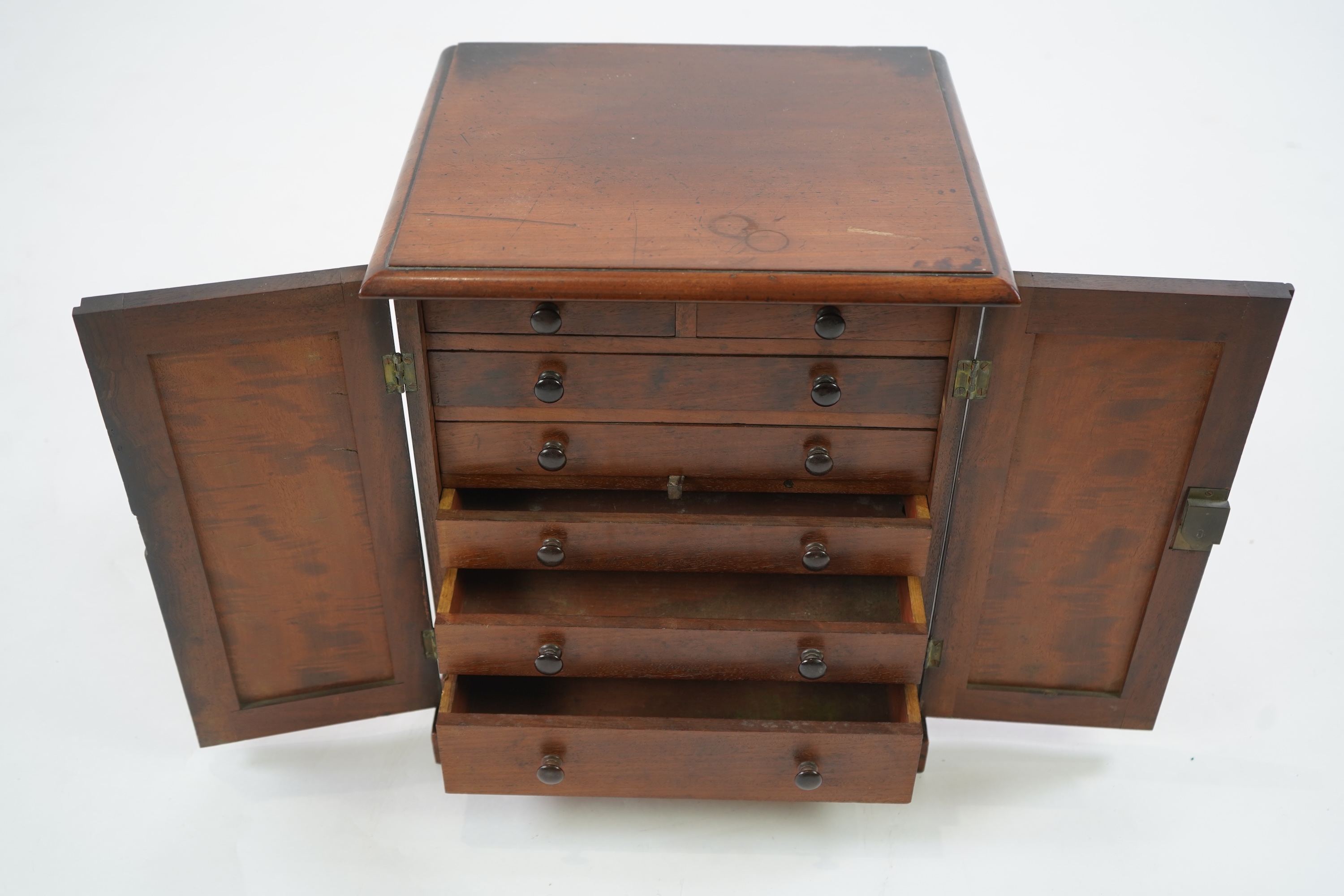 A George IV mahogany table top collectors cabinet